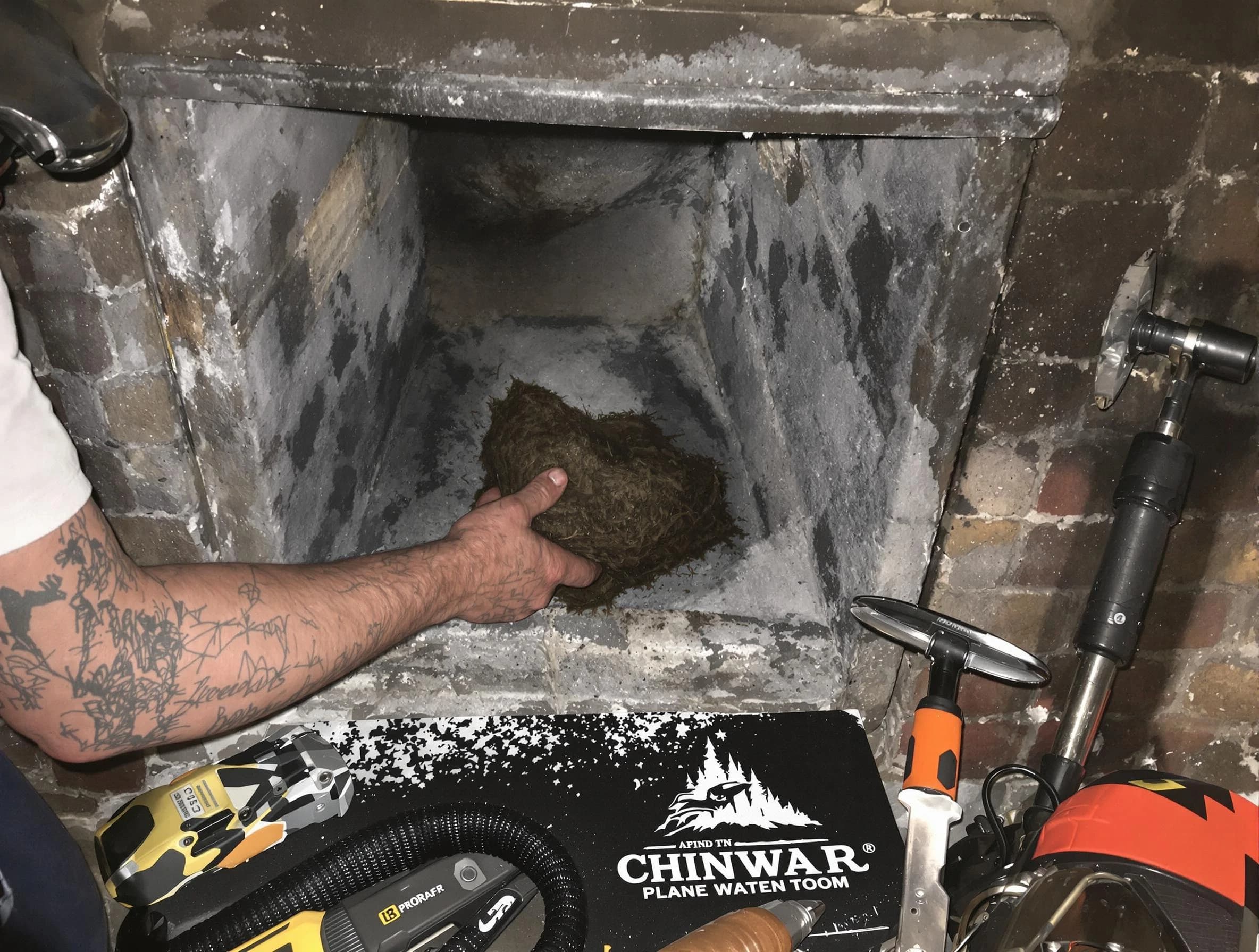 Bethany Chimney Sweep safely removing debris and screening chimney in Bethany, OK